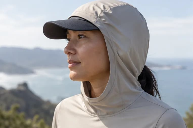 Illustrative sun hood over a running cap